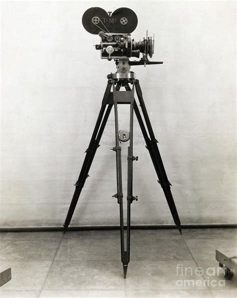 Early Movie Camera On Tripod by Bettmann