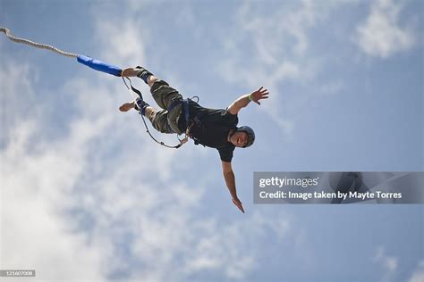 Bungee Jumping Man High-Res Stock Photo - Getty Images