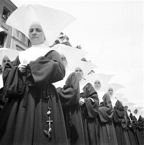 black and white photograph of women in nun robes