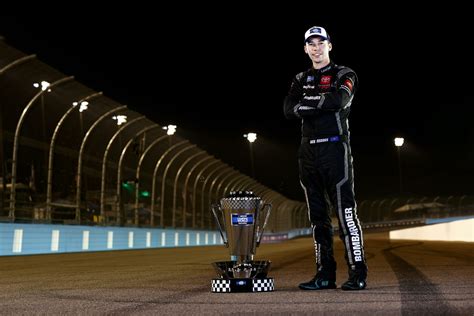 Portraits of a champion: 2021 title winners with their trophies | NASCAR