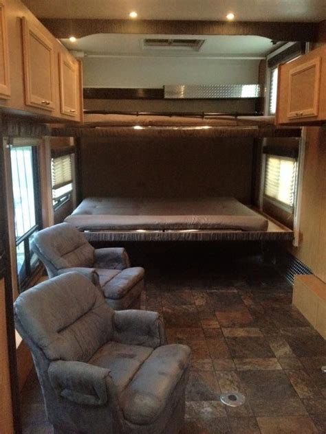 Toy Hauler - 2009 Carson Fun Runner 27SB stacking electric queen-size bunk beds | Queen size ...