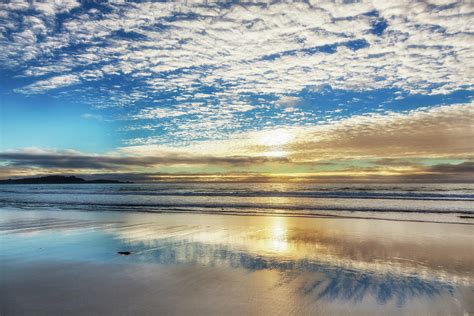 Sunset On Carmel Beach, California by Alvis Upitis