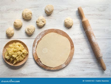 Cooking Traditional Pies with Potatoes. Placinta, Traditional Moldovan Pastries Stock Image ...