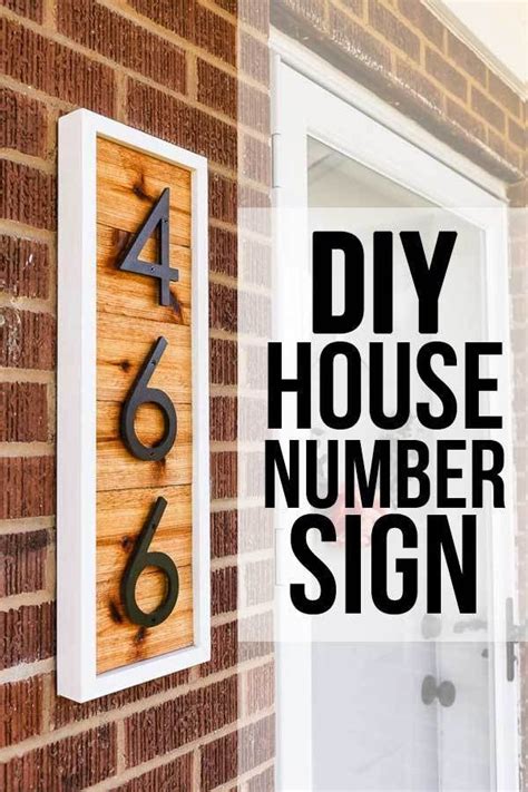 a house number sign with the words diy house number sign on it's side