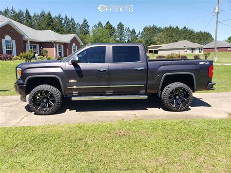 2014 GMC Sierra 1500 with 22x12 -44 Hostile Alpha and 33/12.5R22 Atturo Trail Blade MT and ...