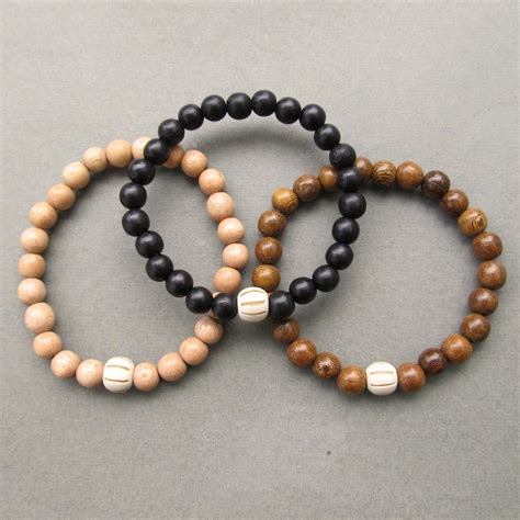 Wooden Beaded Bracelets With Carved Bead - Choose Your Colour | Jewellery by Lowusu