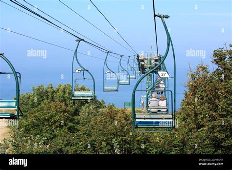 The Needles Chair Lift, Isle of Wight, 2021. A chairlift carrying tourists down to Allum Bay, so ...