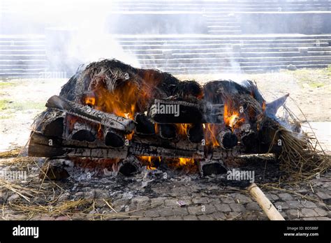 Hindu Funeral Pyre For Cremation In Progress By The Bagmati River Stock Photo, Royalty Free ...