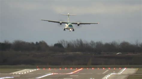 Storm Pia: Watch moment plane struggles to land at Birmingham Airport ...