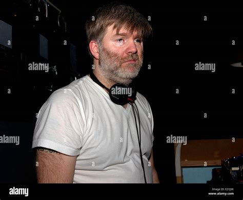 LCD Soundsystem's James Murphy performs a DJ set in an Austin nightclub ...