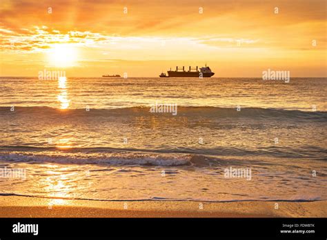 Ship, sea, sunset Stock Photo - Alamy