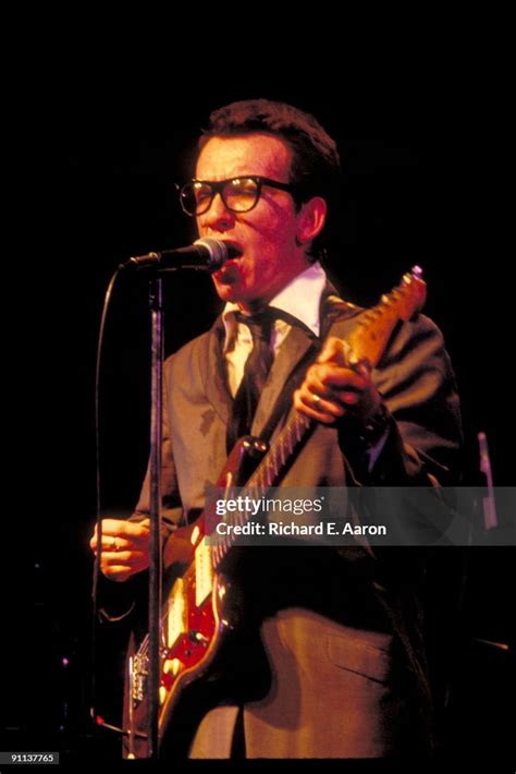 Elvis Costello performs live on stage with The Attractions at the ...