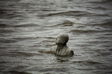 The Rising Tide - Underwater Sculpture by Jason deCaires Taylor