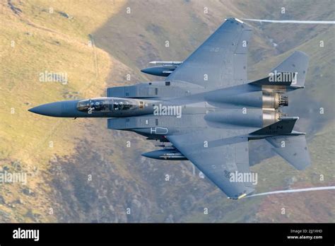 A top view of a fighter jet in flight - F-15E Strike Eagle Stock Photo - Alamy