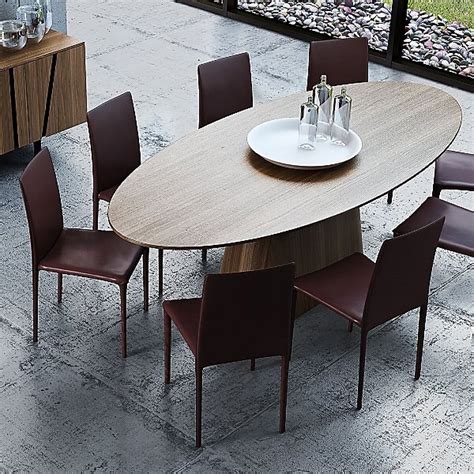51 Oval and Racetrack Shaped Dining Tables to Elevate Your Dining Space