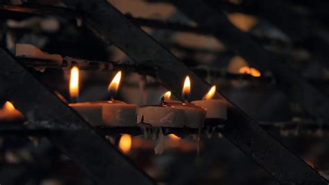 Close-up Shot Of Burning Candles In Catholic Stock Footage SBV-334565461 - Storyblocks