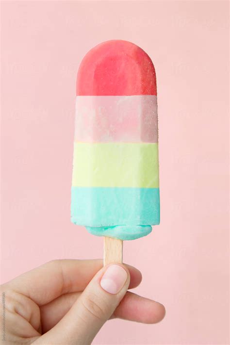 "Pastel Colors Popsicle On Pink Background" by Stocksy Contributor "Sonja Lekovic" - Stocksy