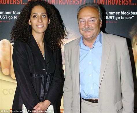 George Galloway's third wife Rima Husseini (and mother of his new baby) says they're still wed ...