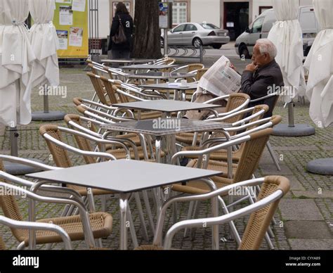 Old man reading newspaper Stock Photo - Alamy