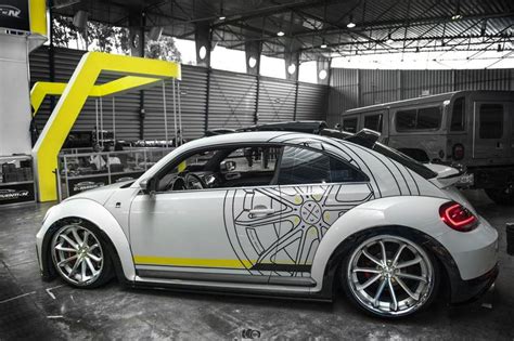 Customized to Impress: White Volkswagen Beetle Dressed in Aftermarket Parts | Volkswagen beetle ...