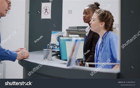 Diverse Medical Staff Working Hospital Reception Stock Photo 2196978527 ...