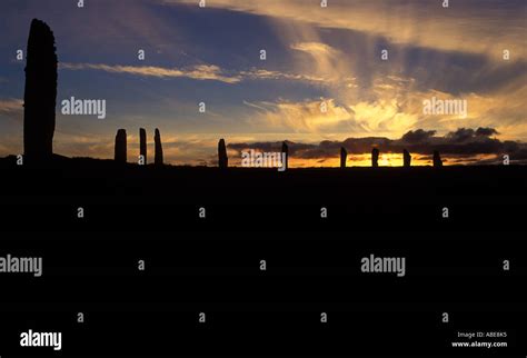 Sunset at the prehistoric Ring of Brodgar (Brogar), stone circle and ...