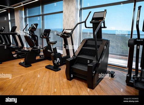 Modern gym interior with new fitness equipment Stock Photo - Alamy