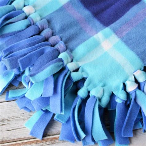 How to Make a Fleece Tie Blanket | Tie blankets, Fleece tie blankets, Fleece blanket edging