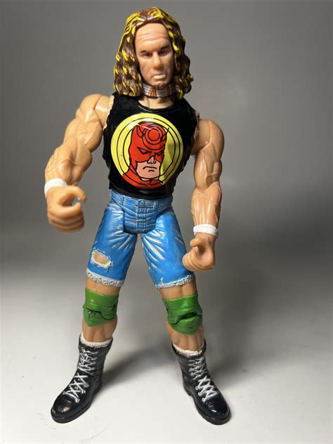 Can anyone guess what action figure this is? I know it’s 1990s WWF ...