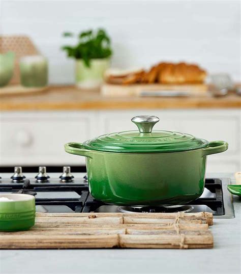 Le Creuset Cast Iron Signature Round Casserole Dish (24cm) | Harrods IN