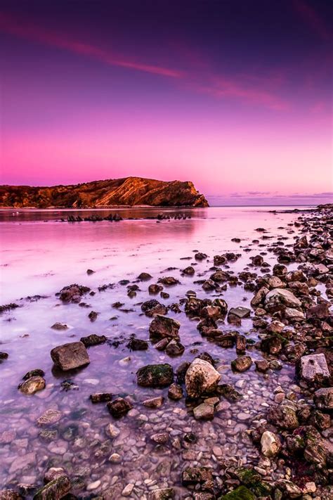 Lulworth Cove Sunset | Lulworth cove, Wonders of the world, Jurassic coast