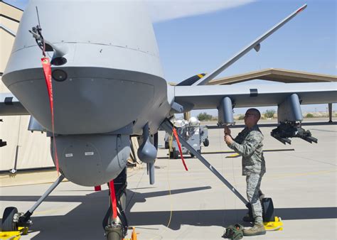 Arming MQ-9 Reaper Hunter/Killer Unmanned Combat Air Vehicle (UCAV ...