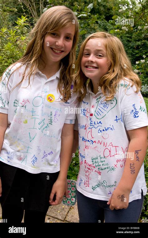 Portrait of school girls at a school leavers party wearing signed school uniform Stock Photo - Alamy