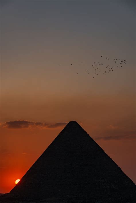 Silhouette of Pyramids during Sunset · Free Stock Photo