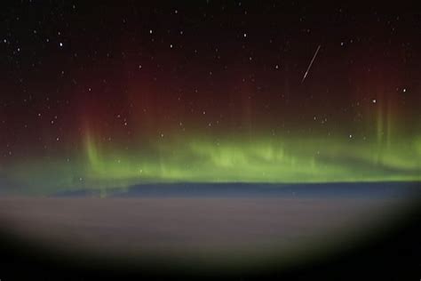 Aurora Borealis Time-Lapse Photographed Through an Airplane Window