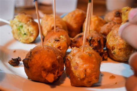 Fried conch fritters – finger foods on stick