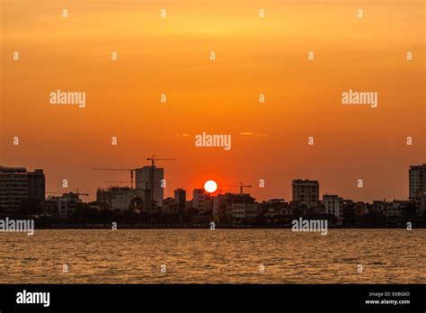 Sunset on West lake, Ho tay, Hanoi, Vietnam Stock Photo - Alamy