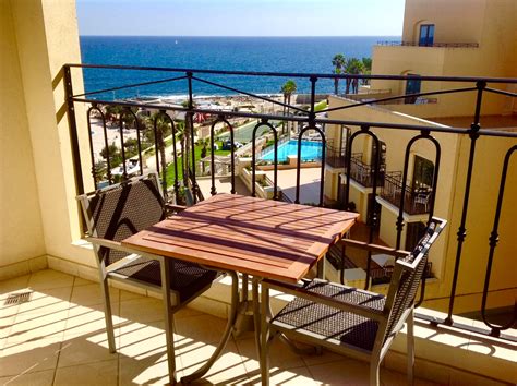 hilton malta hotels balcony | Upon Boarding