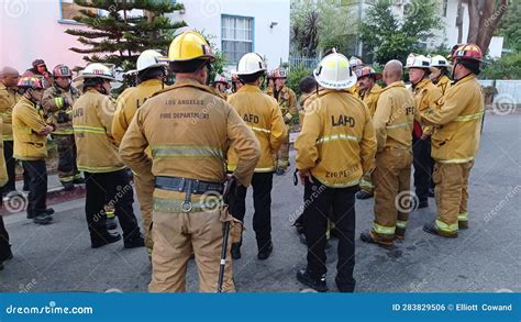 A Team of Los Angeles Firefighters Debrief Following a Fire on ...