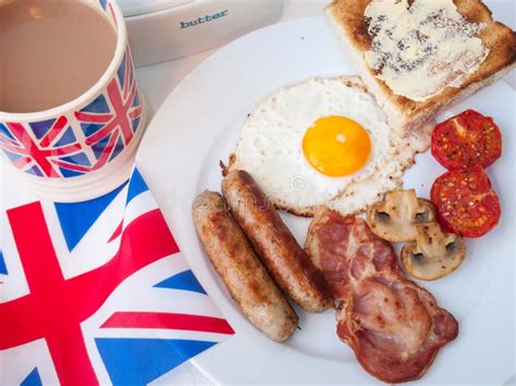 Bacon and Eggs with Cup of Tea, Toast and British Flag Stock Photo - Image of unhealthy, sausage ...