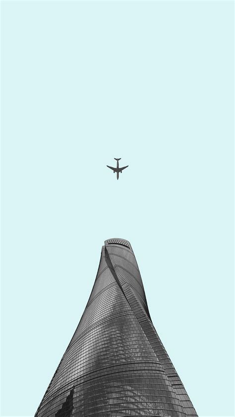 Download wallpaper 2160x3840 plane, skyscraper, minimalism ...