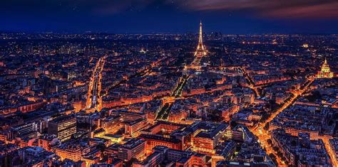 Magnificent aerial view of Paris, France And Eiffel tower at night Photograph by Artpics