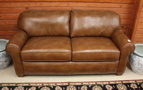 Lot - BROWN LEATHER SLEEPER SOFA, made by Flexsteel Indu