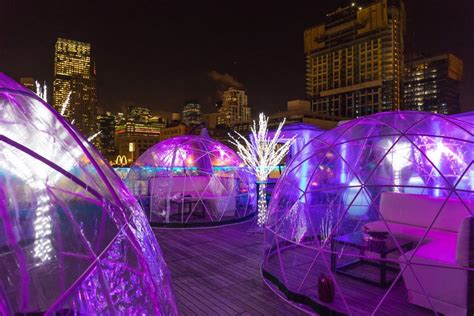 The Godfrey's Rooftop Suits Up With Transparent Igloo Lounges