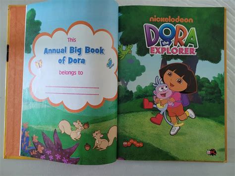 The Annual Big Book of Dora, 興趣及遊戲, 書本 & 文具, 小朋友書 - Carousell