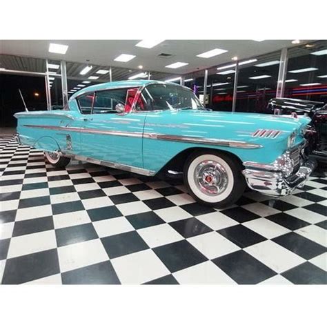 57 Chevy Impala on Checkerboard Floor