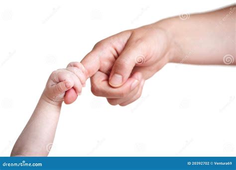 Baby's Hand Holding Finger Of Mother Stock Photography - Image: 20392702