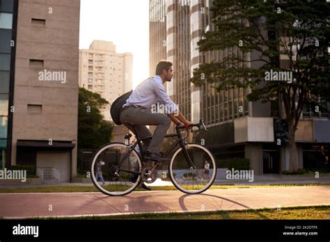 Commuting the carbon-free way. Shot of a businessman commuting to work ...