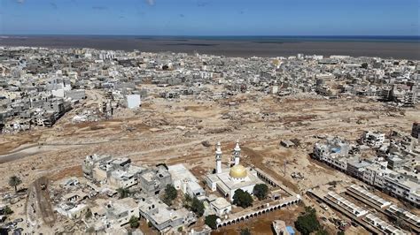 Thousands buried in mass graves in Libyan city of Derna after devastating floods, thousands more ...