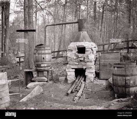 1960s OLD TIME HILLBILLY MOONSHINE STILL IN WOODS STONE FIREPLACE COPPER KETTLE THAT DISTILLS ...